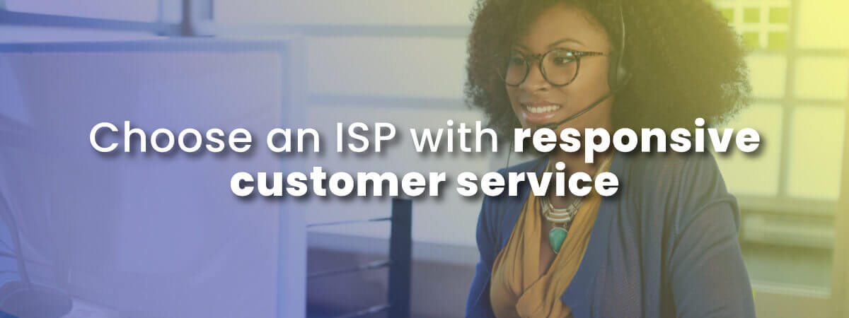 Customer service rep smiles as she works for an ISP with responsive customer service