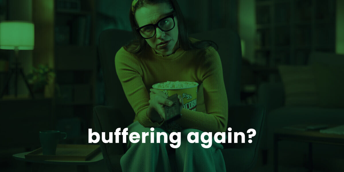 Buffering again with picture of annoyed woman holding bucket of popcorn