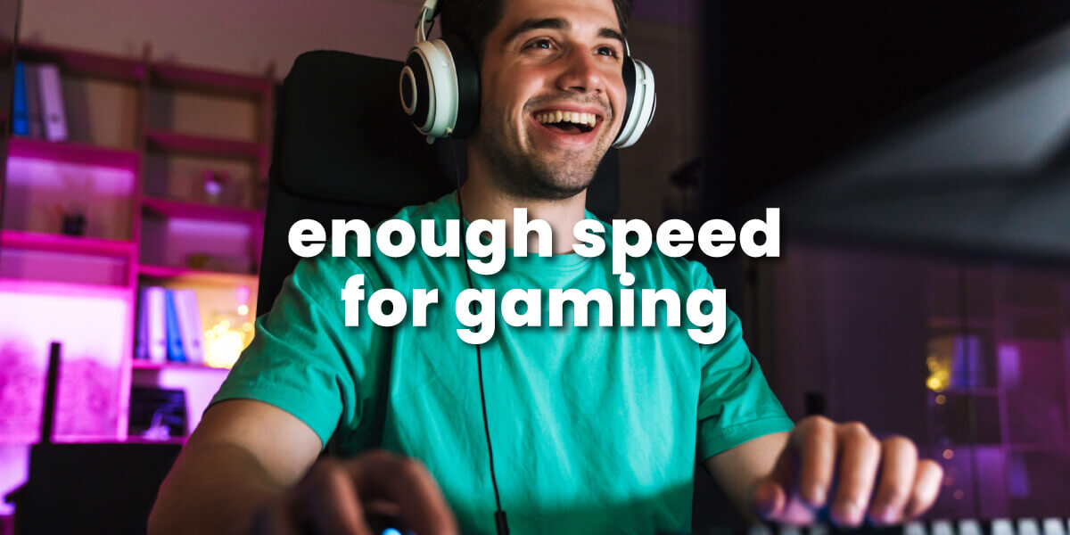 enough speed for gaming with image of smiling man playing online games