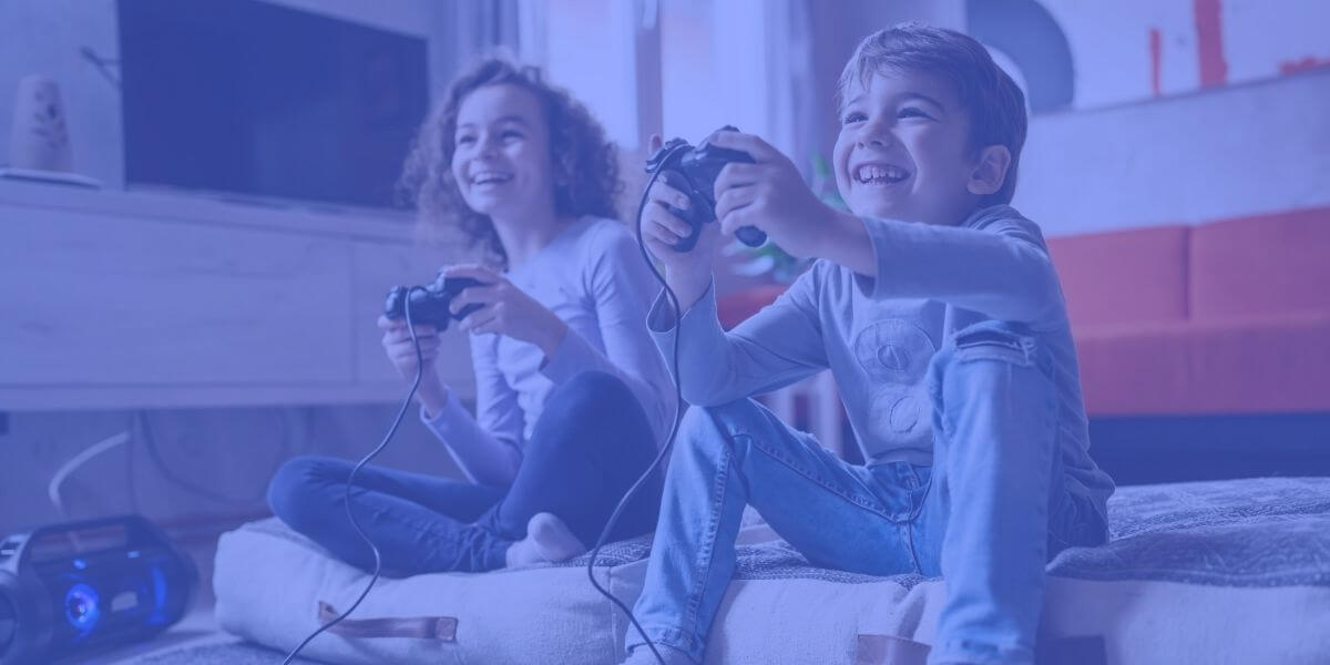 children playing with a game system and games controllers