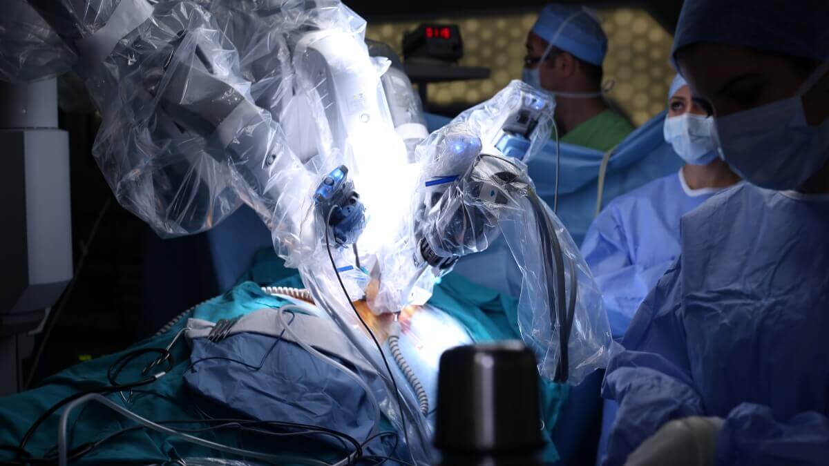 robots perform remote surgery while humans watch