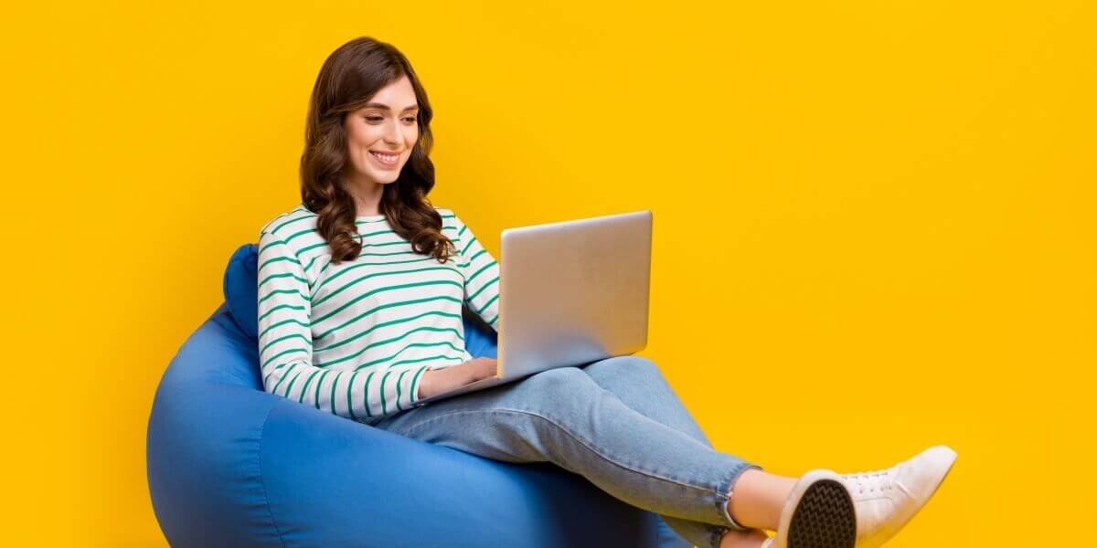 Woman checking her email on a 25 Mbps connection