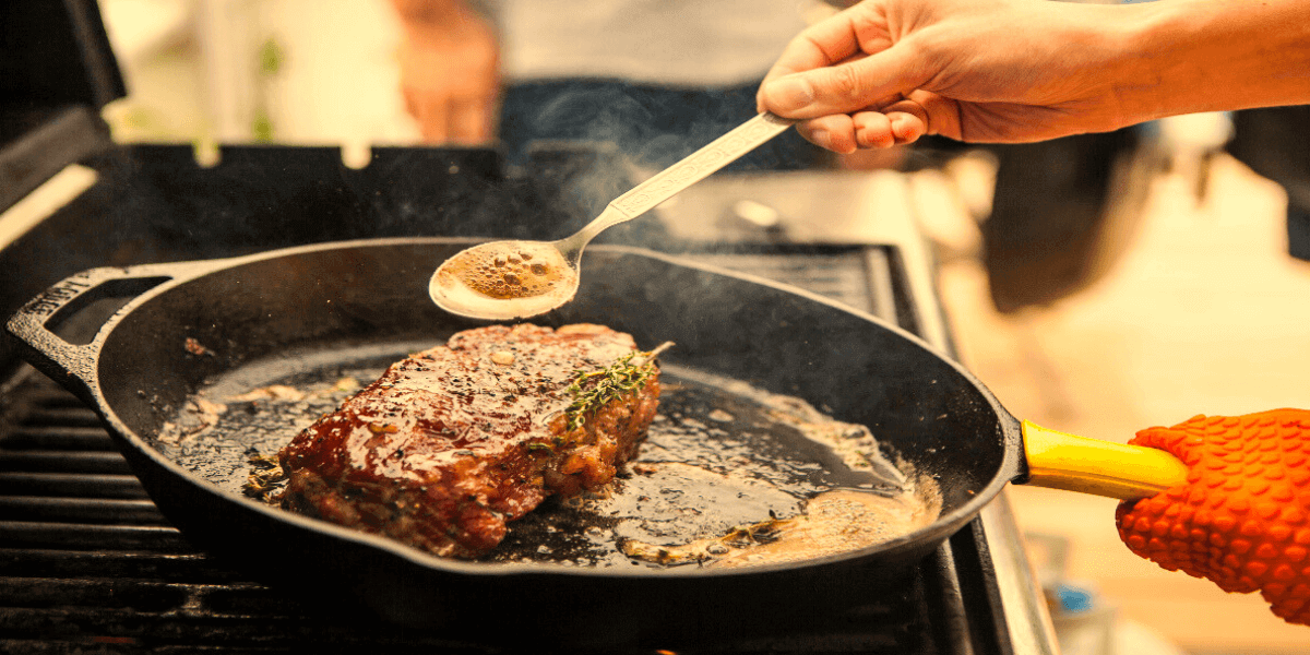 Man cooking steak