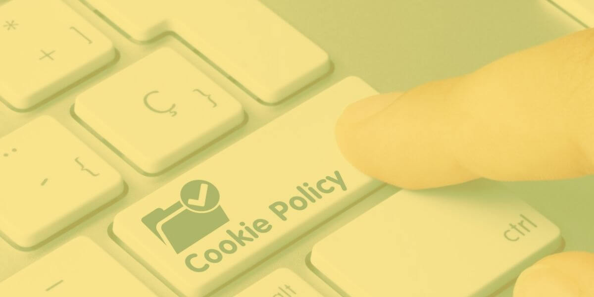 Botón de política de cookies en el teclado del portátil