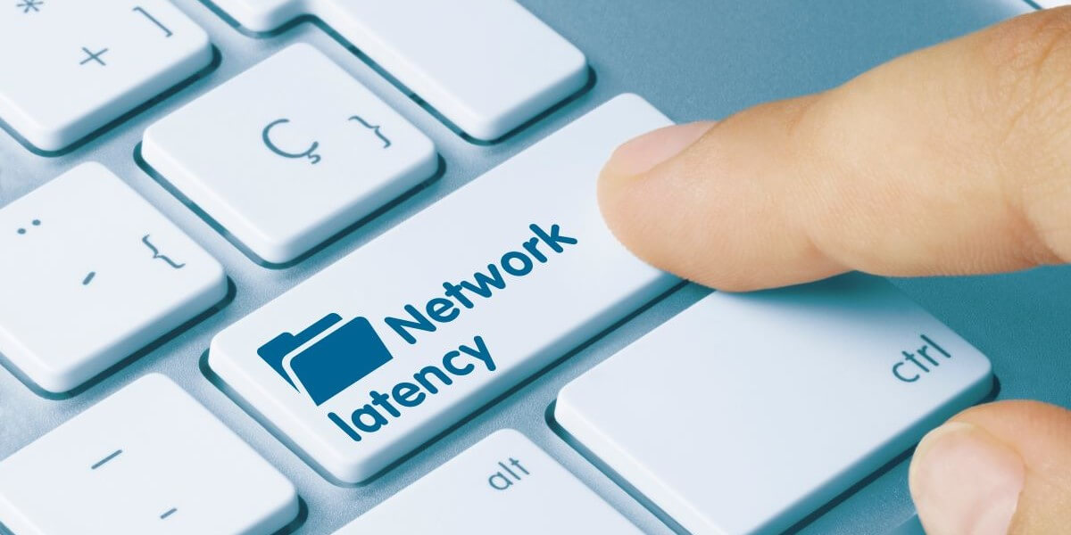 finger touching computer key labeled network latency