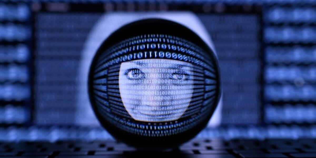 Human woman lokoks out of round lens surrounded by binary code