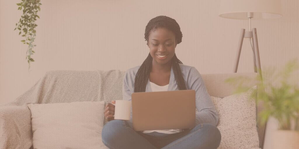 woman using home laptop