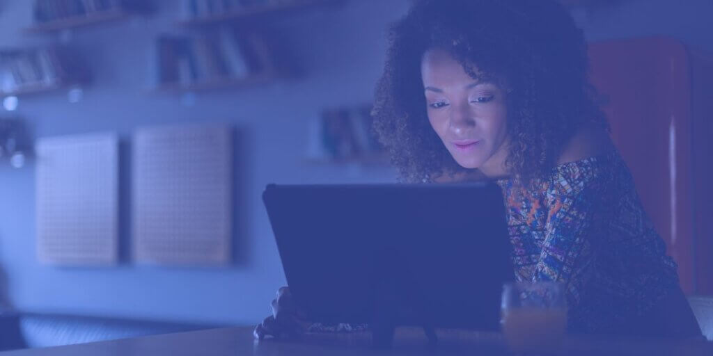 Woman works at night on home Wi-Fi