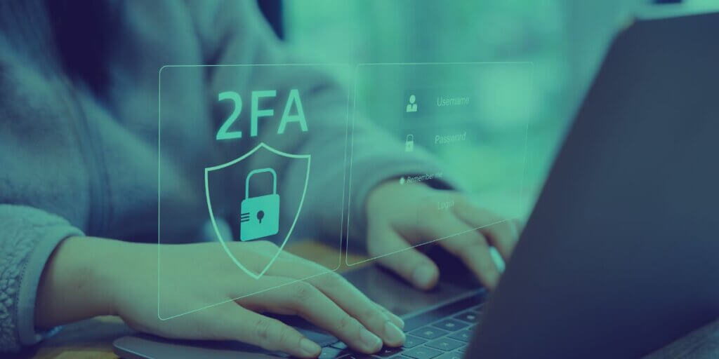 2FA symbol floats above a keyboard to encourage two-factor authentication