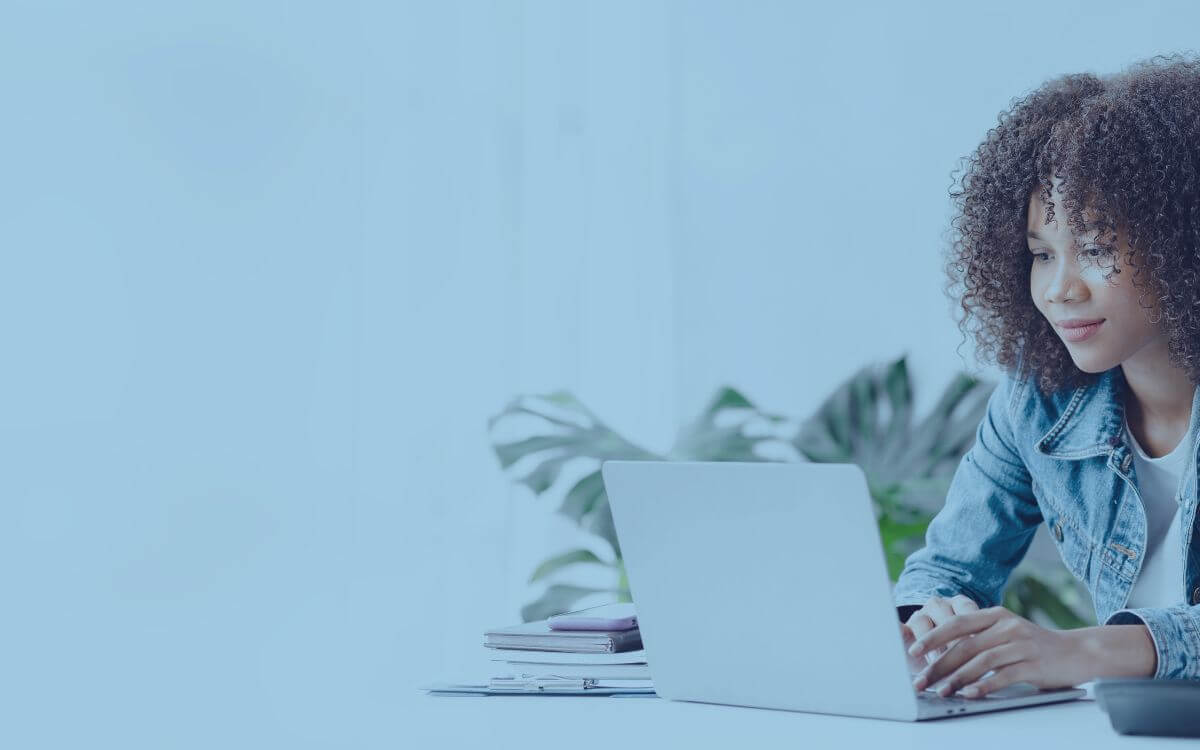 Woman using laptop for online learning