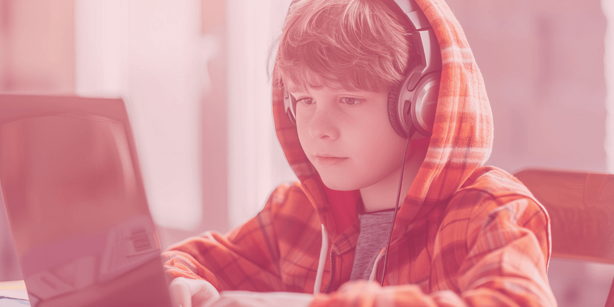 young boy using the computer