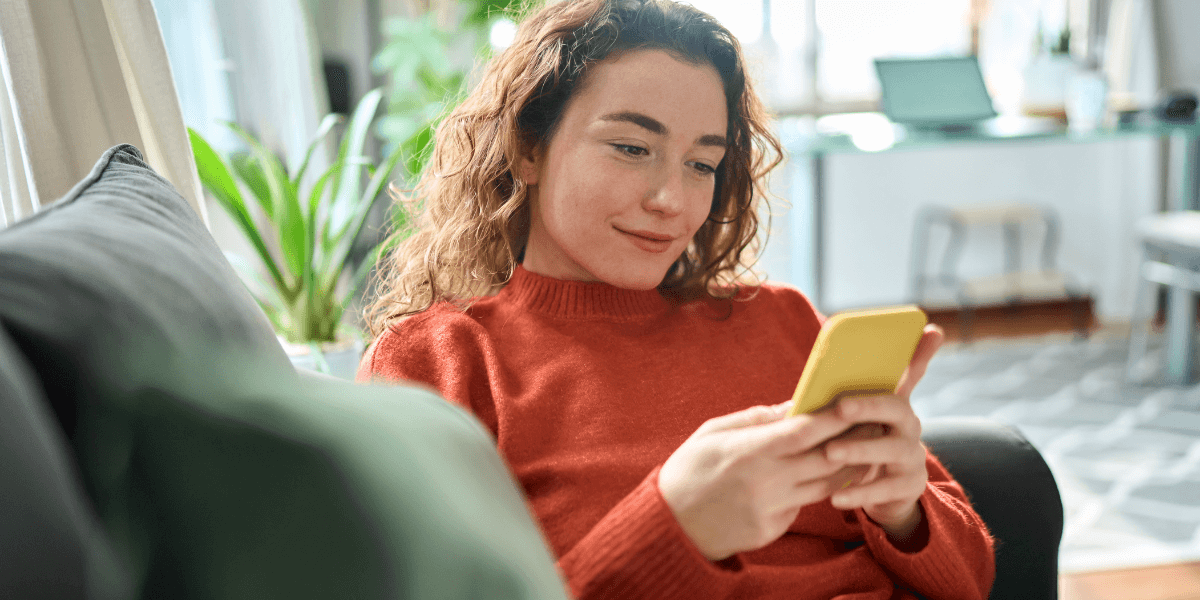 Young woman looking at a smart phone