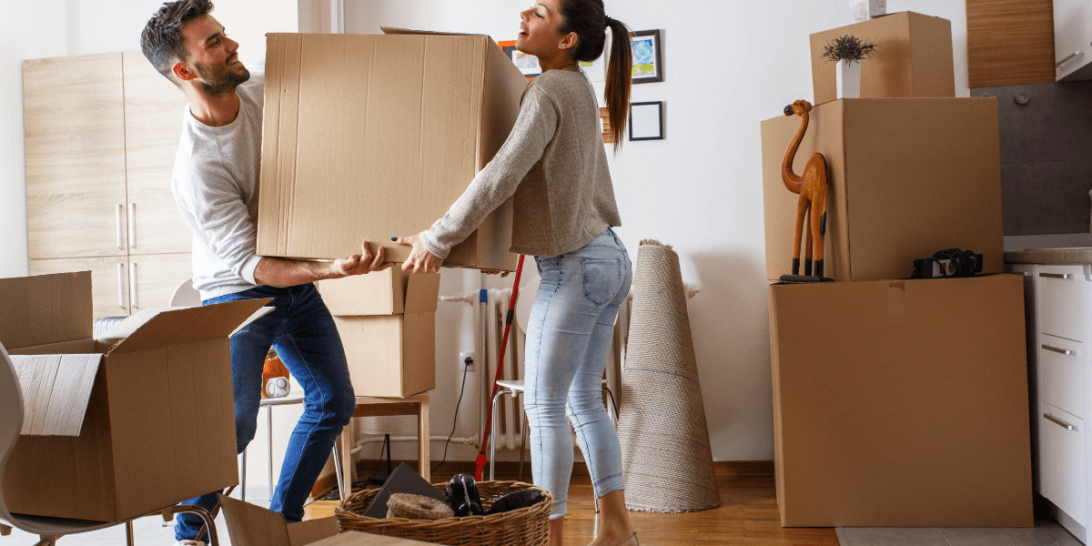 couple with moving boxes