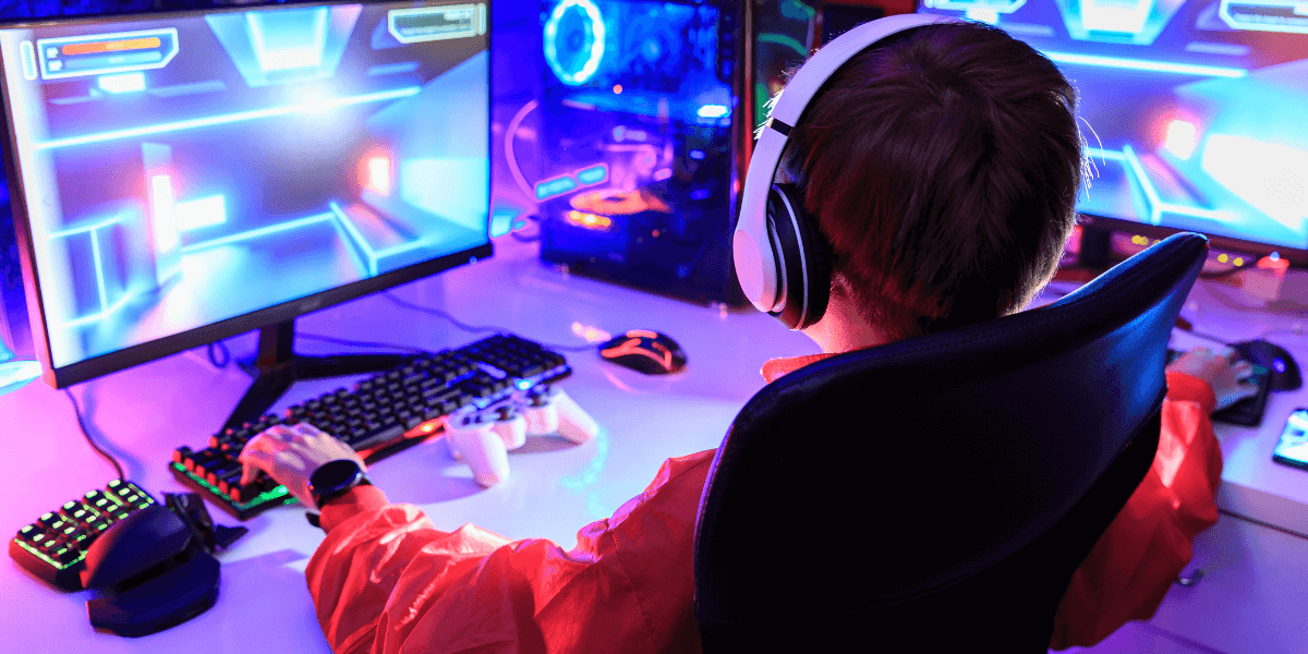 young boy gaming on computer