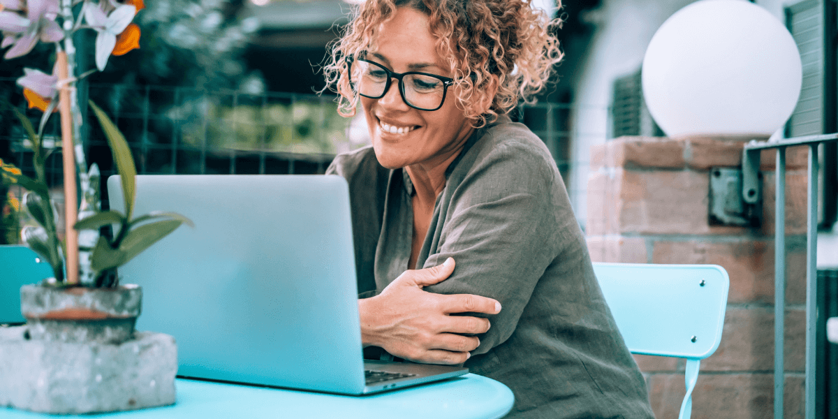 woman using laptop outside