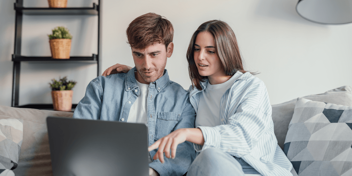 couple using a laptop