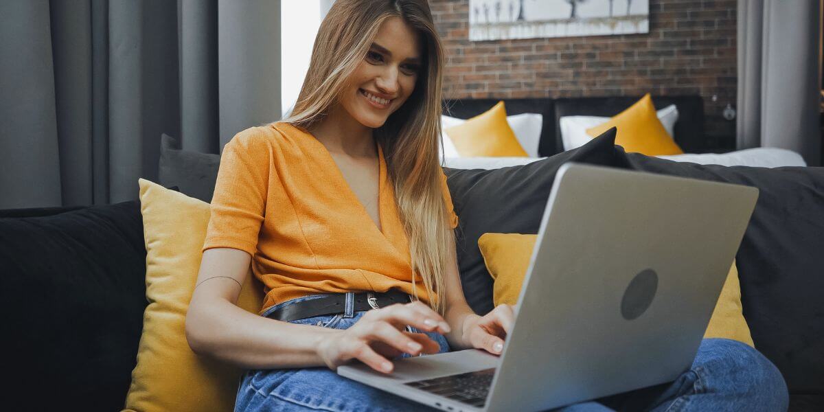 wifi for airbnb womon on laptop