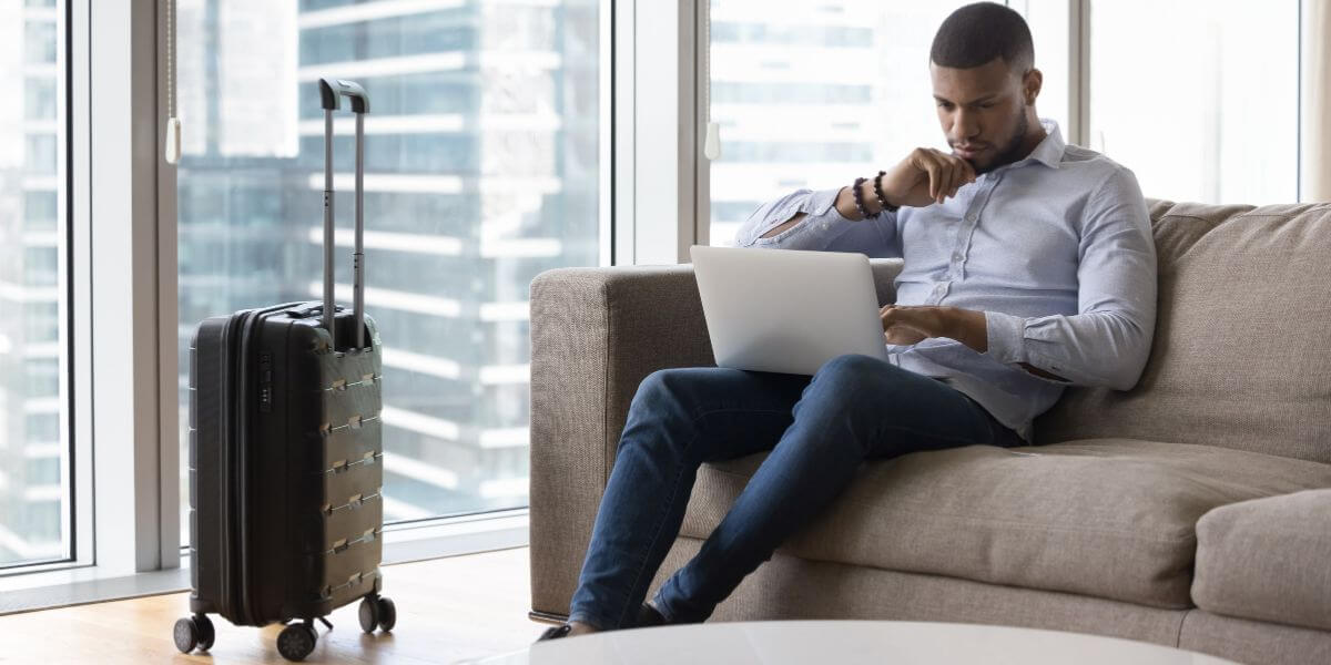 wifi for airbnb man on laptop