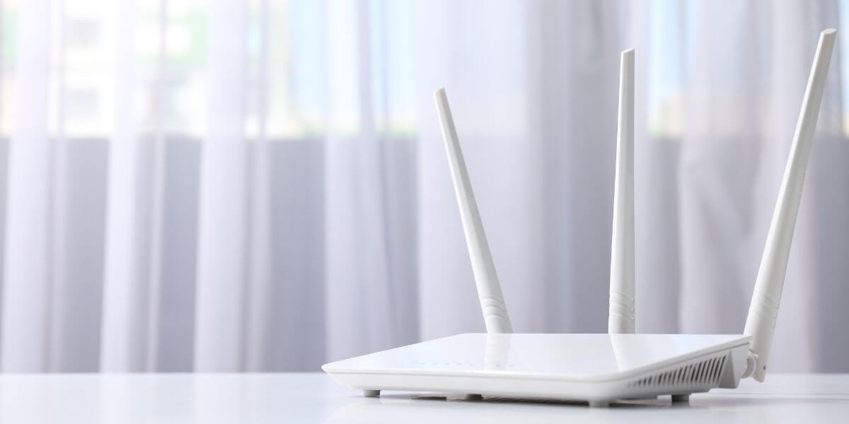 Quality of Service settings white router on table