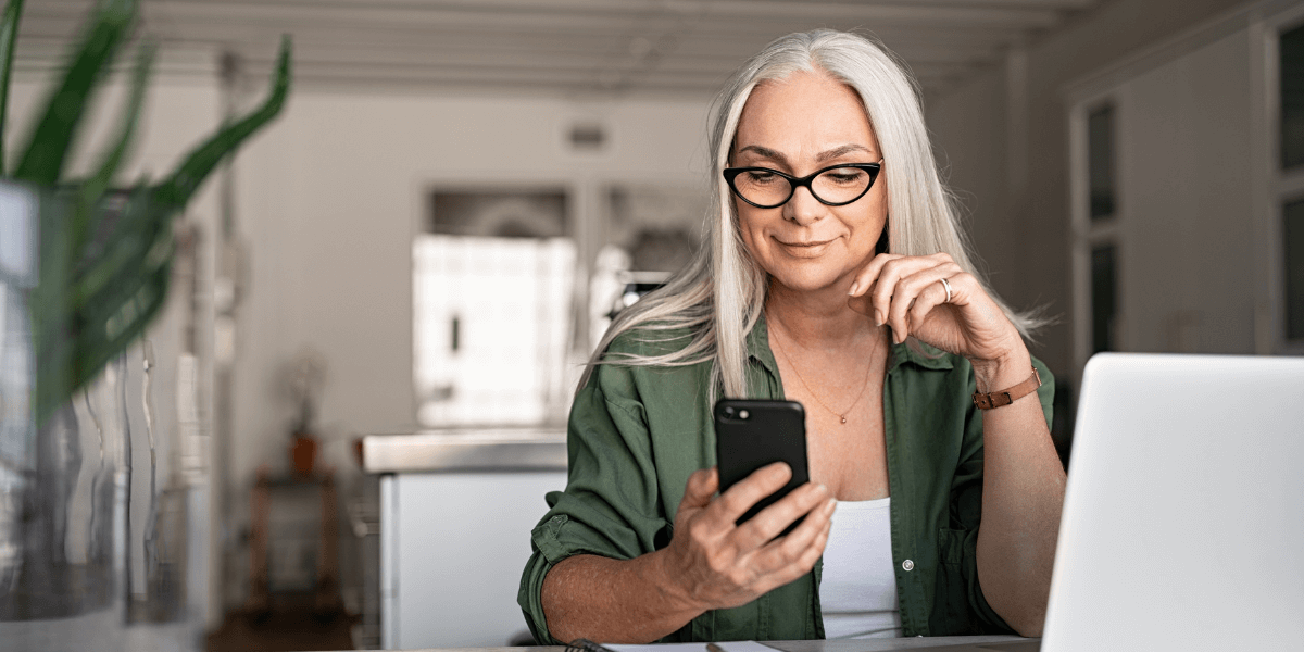 woman looking at her phone