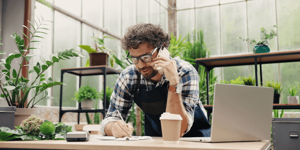 man on phone while working