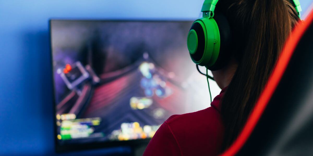 Gamer looking at monitor