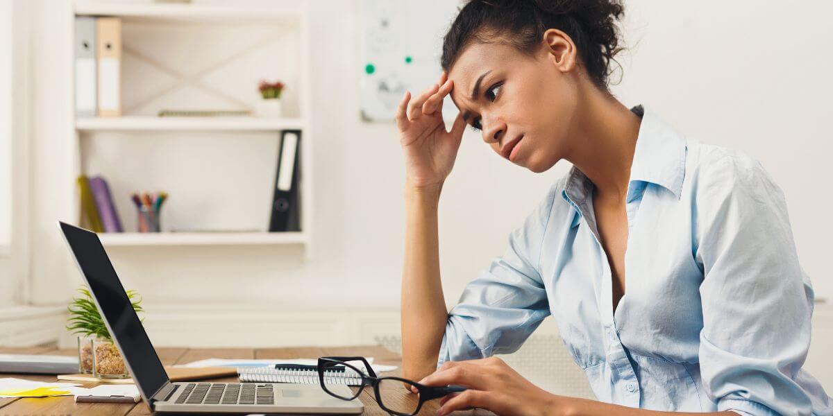 frustrated woman at laptop