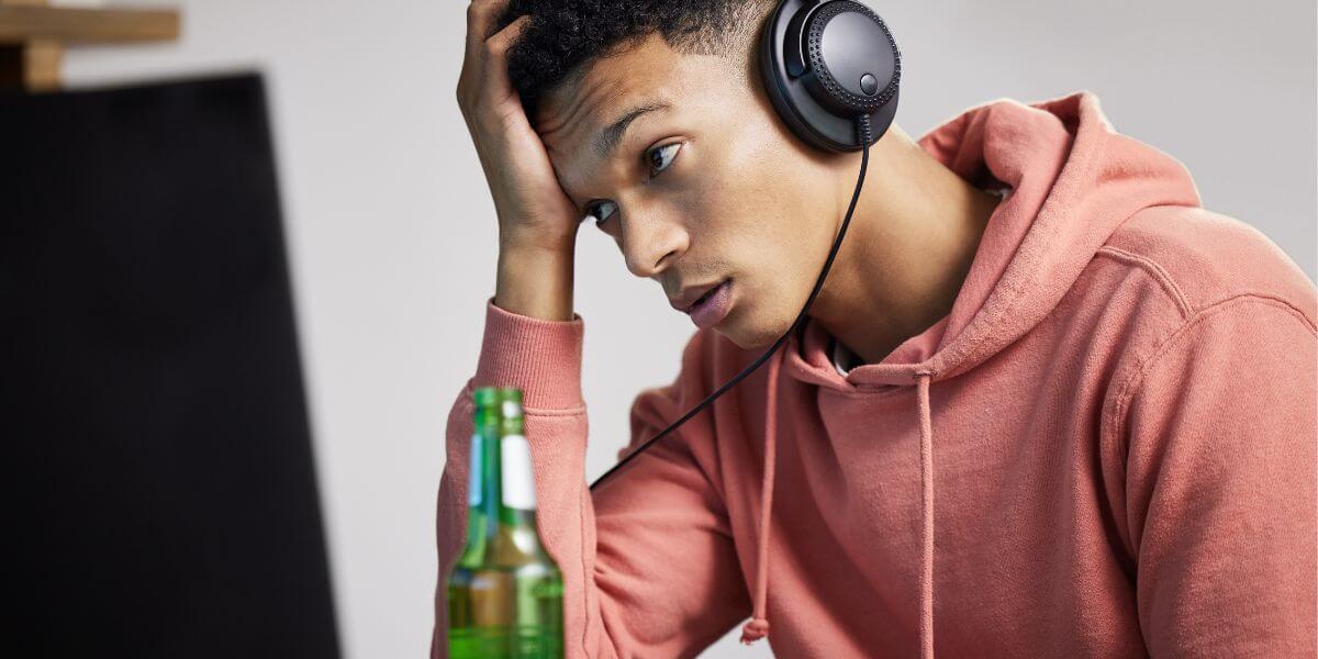 frustrated gamer looking at PC monitor