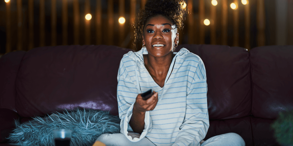 woman watching tv at night