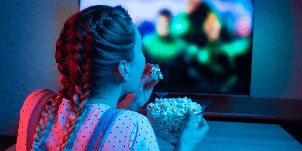 girl watching disney+