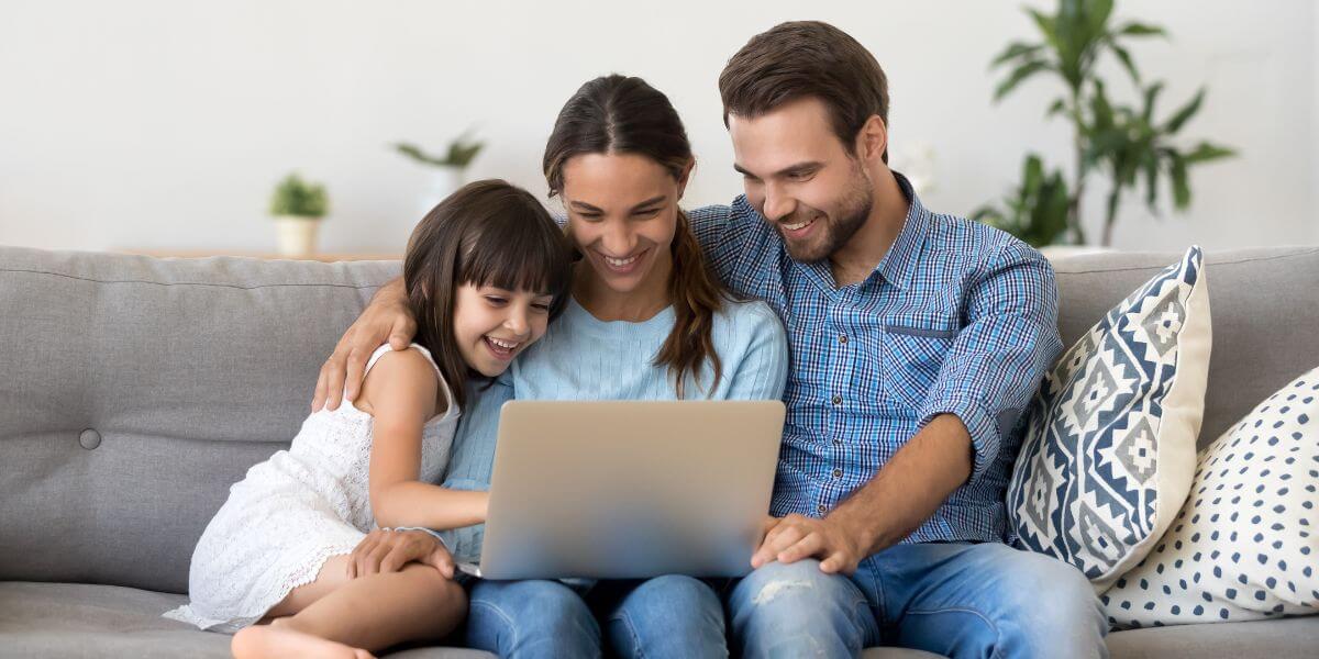 family using laptop