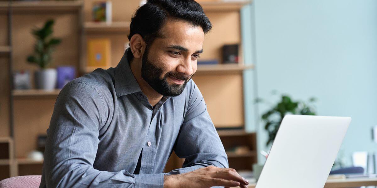 man working on laptop
