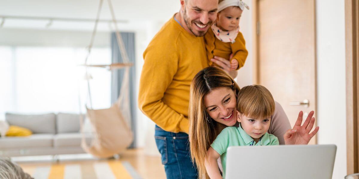 family using laptop
