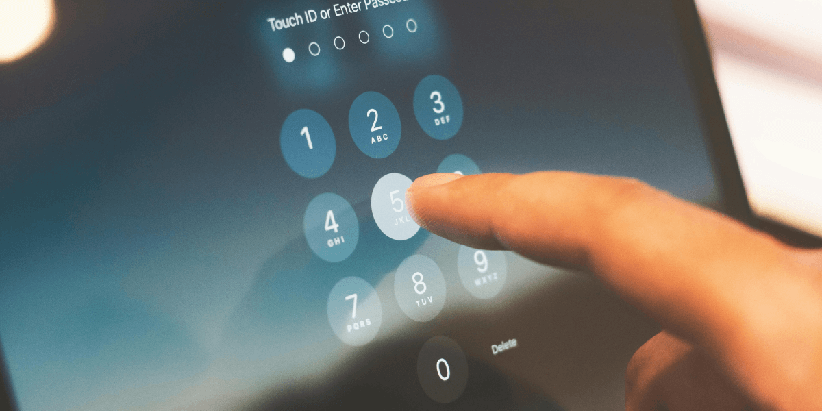 person typing in a passcode