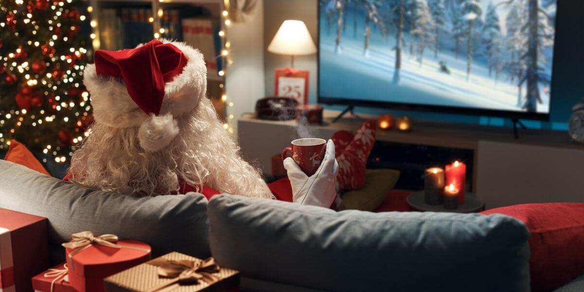 santa watching tv on couch