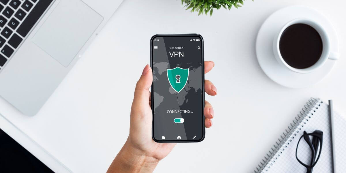 hand using phone and vpn