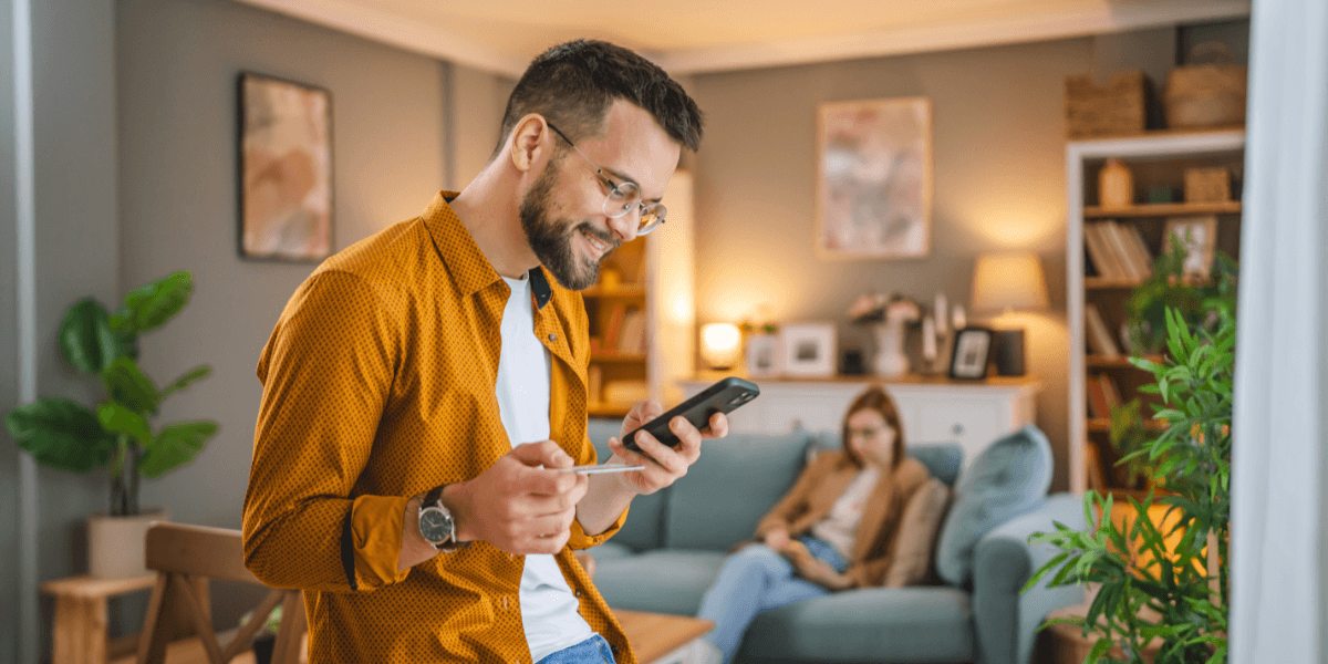 man looking at phone