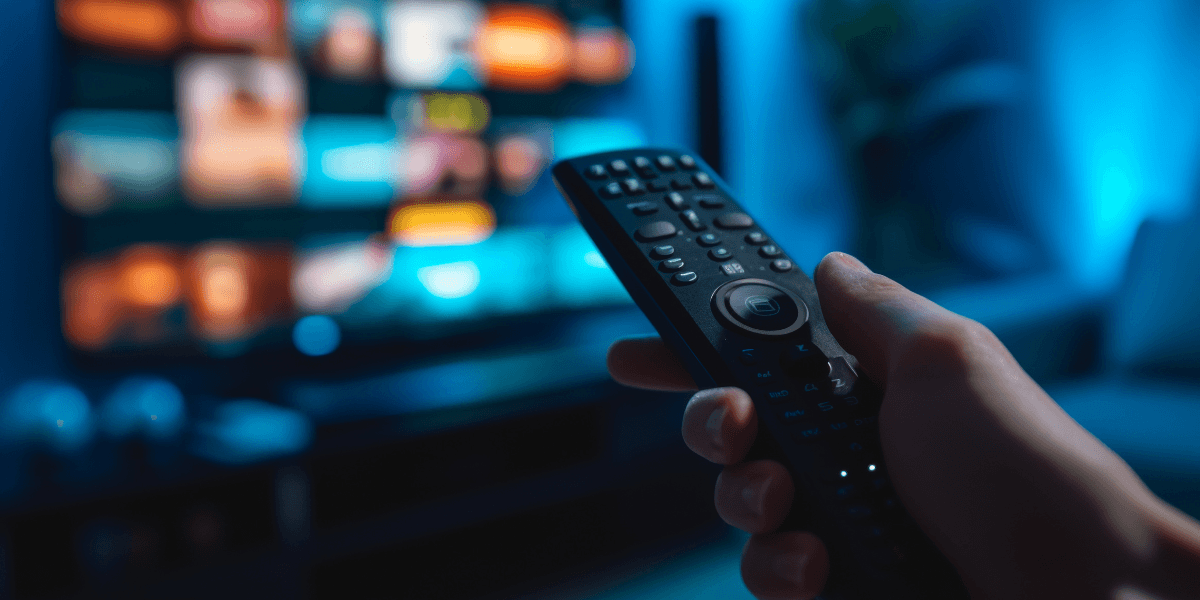 tv remote in front of a tv