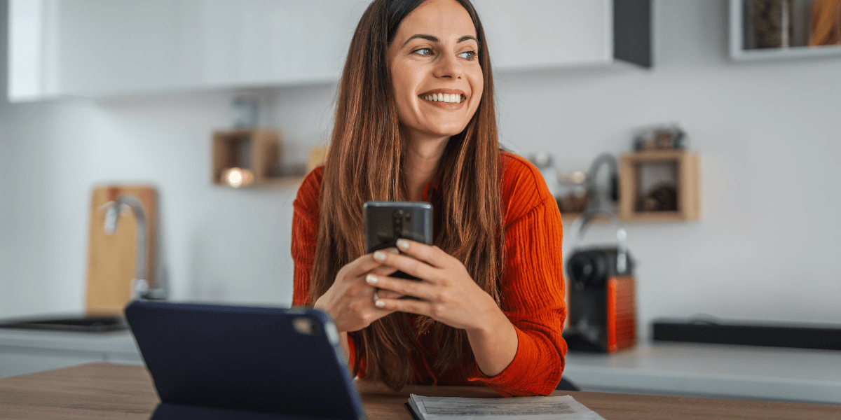 woman on phone smiling