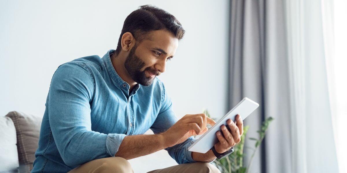 man using tablet