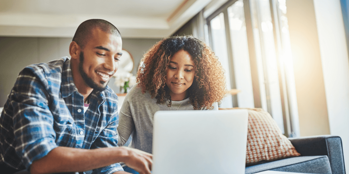 couple looking at a laptop
