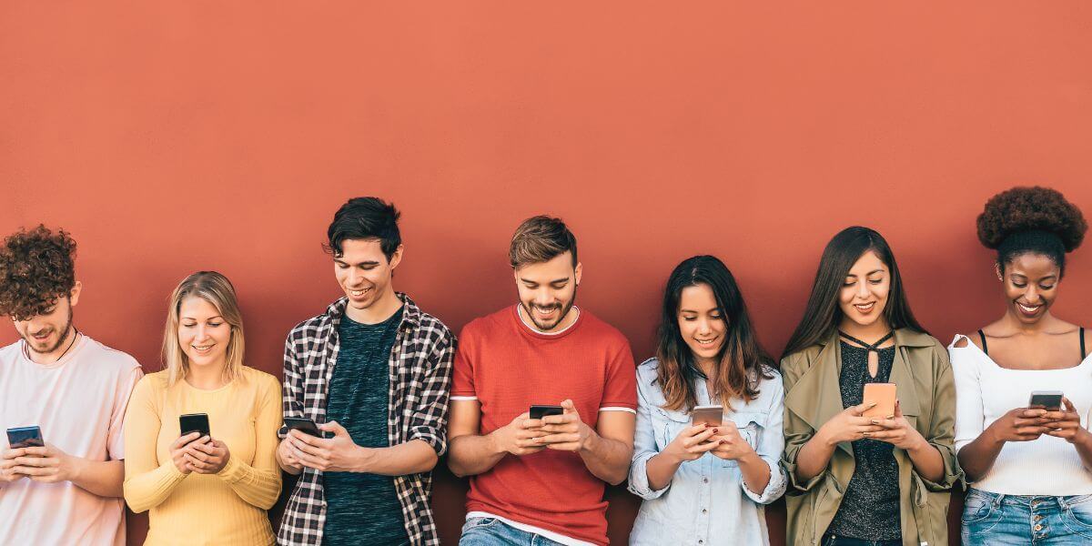 group of people using phones