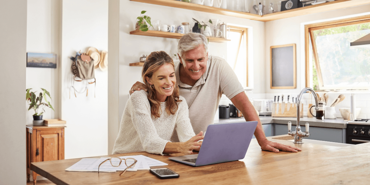 couple looking at a laptop
