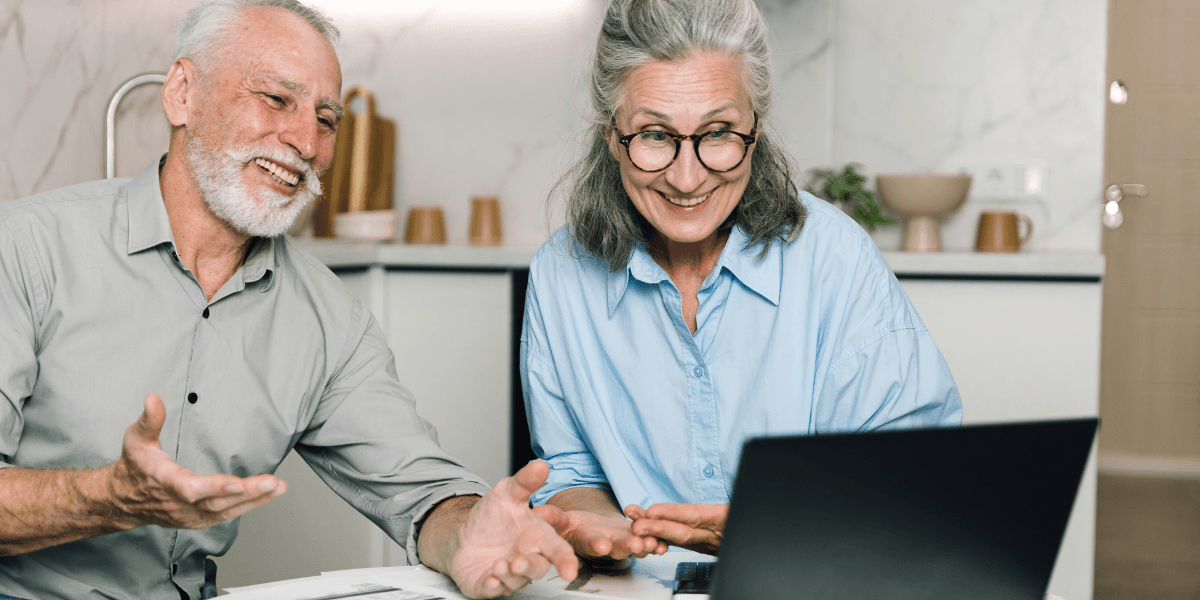 older couple looking at laptop