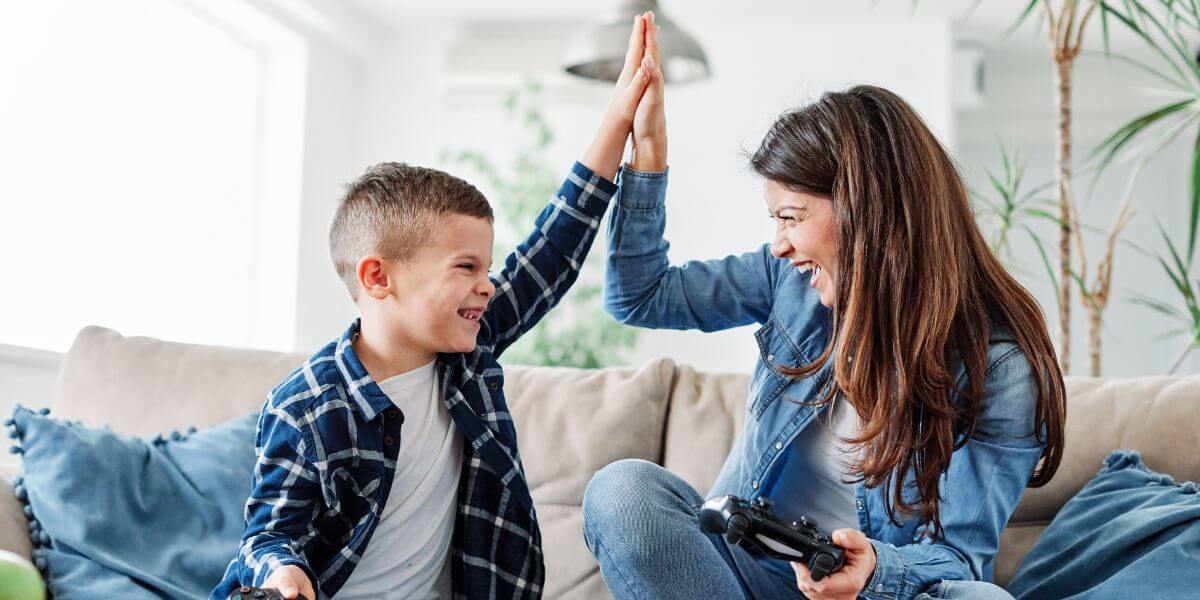 woman and kid playing video games