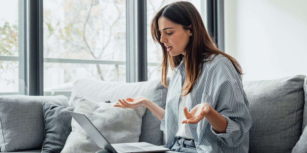 woman frustrated with laptop