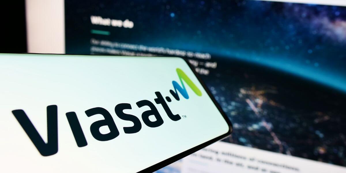 ViaSat logo on phone with monitor