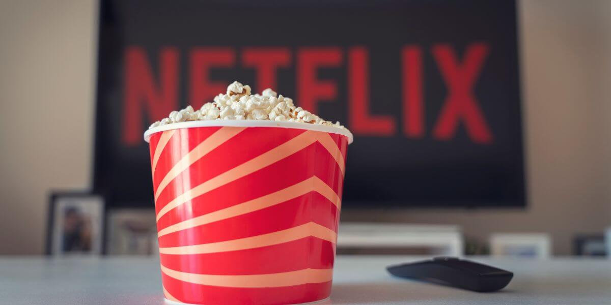 popcorn bucket with Netflix on TV