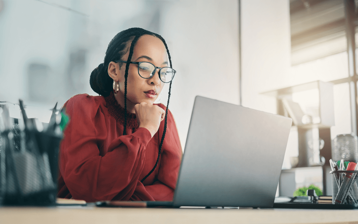 Woman looking at her laptop