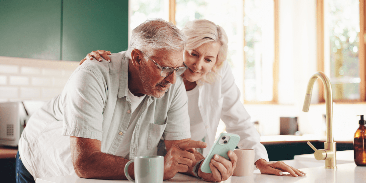 older couple looking at a smartphone